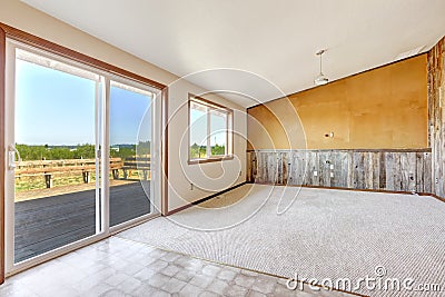 Empty countryside house interior. Orange wall with wooden plank Stock Photo