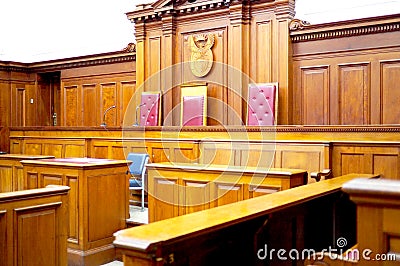 Empty courtroom, with old wooden paneling Stock Photo