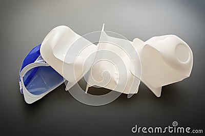 Empty crushed plastic yogurt pots Stock Photo