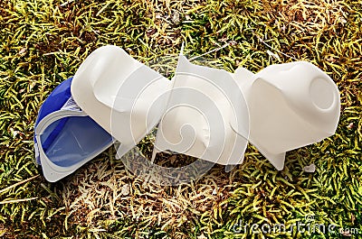 Empty crushed plastic yogurt pots Stock Photo