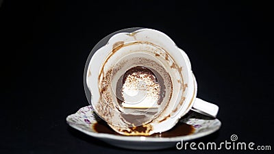 An empty cup of coffee with a precipitate inside Stock Photo