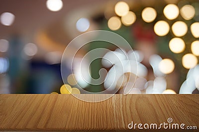 Empty dark wooden table in front of abstract blurred bokeh background of restaurant. Editorial Stock Photo