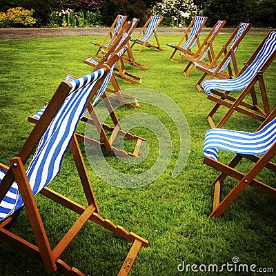 Empty deckchairs Stock Photo