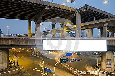 Empty digital billboard that installed on expressway at intersection on city in evening time Stock Photo