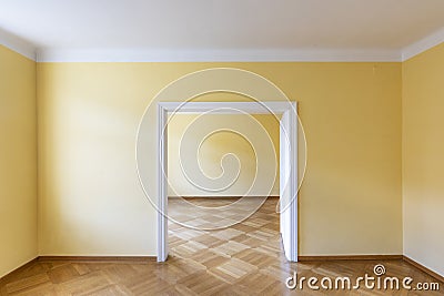 Empty dining or dancing room of an old vintage house with wooden parket Stock Photo