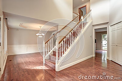 Empty entrance room with staircase. Stock Photo