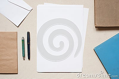 Empty envelopes and sheets of paper on the table Stock Photo