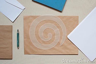 Empty envelopes and sheets of paper on the table Stock Photo