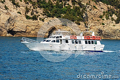 Ferry Boat in Motion in front of the Coast of Cinque Terre - Liguria Italy Editorial Stock Photo