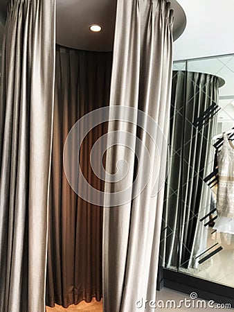 empty fitting room in clothing shop Stock Photo