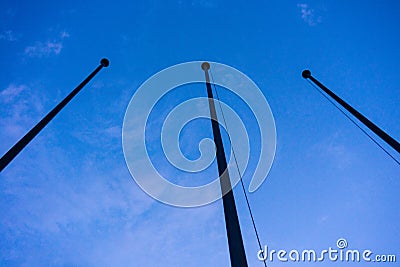 Empty flag post low angle view in blue hour night abstract architecture Stock Photo