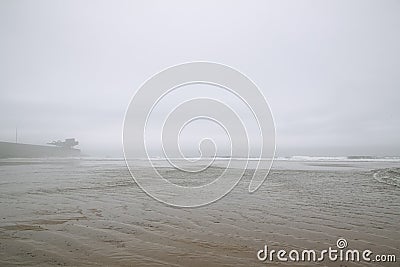 Empty foggy beach Stock Photo