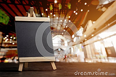 empty food menu board with black mockup space with blurred restaurant background Stock Photo