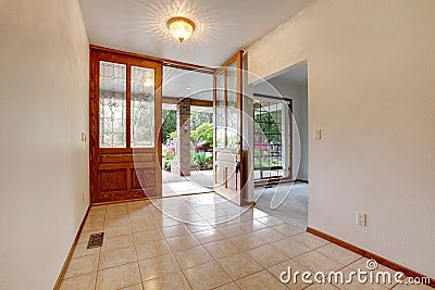 Empty front entrance with open door. Home interior. Stock Photo