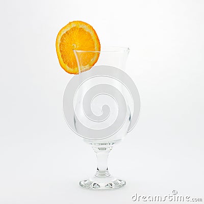 Empty glass with orange slice Stock Photo