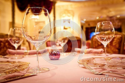 Empty glasses set in restaurant Stock Photo