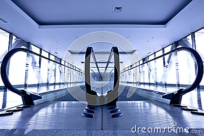 Empty gray escalator Stock Photo