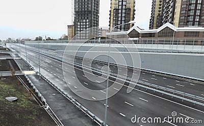 Empty gray highway, outgoing to the horizon. Soft focus. Stock Photo