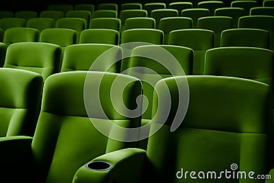empty green seats in cinema, domestic intimacy, zoom in, up close Stock Photo