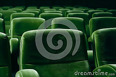 empty green seats in cinema, domestic intimacy, zoom in, up close Stock Photo