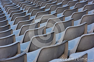 Empty grey seats on a seating tribune Stock Photo