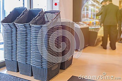 empty grey shopping basket in department store Stock Photo