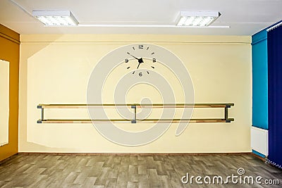 Empty hall dance hall with clock on the wall Stock Photo