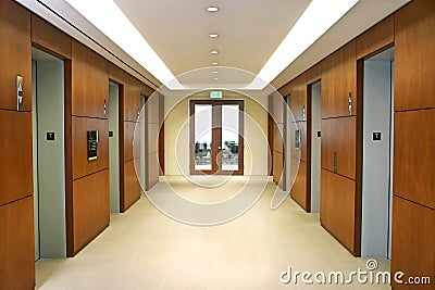 Empty hallway between elevators Stock Photo