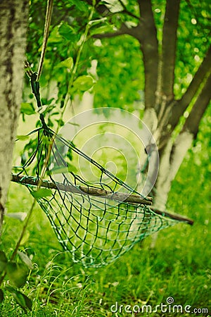 Empty hammock strung Stock Photo