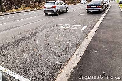 Empty handicapped parking on a street Editorial Stock Photo