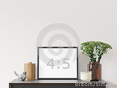 Empty horizontal frame 4:5 on white wall. Stock Photo