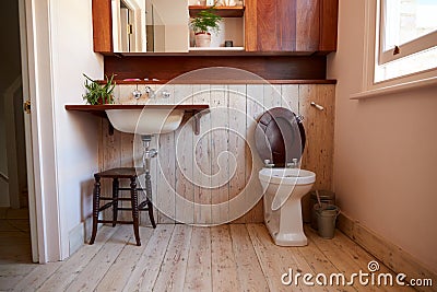 Empty Interior Of Contemporary Cloakroom With Sink And Toilet Stock Photo