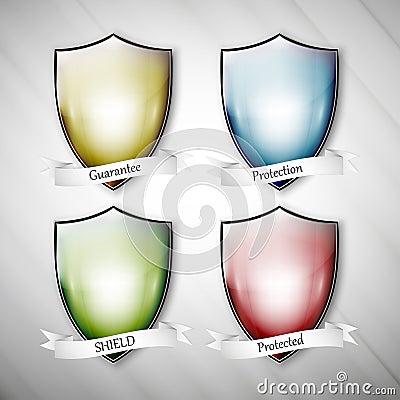 Empty isolated colored shields on dirty gray Vector Illustration