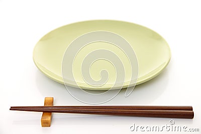 Empty Japanese dish with chopsticks Stock Photo