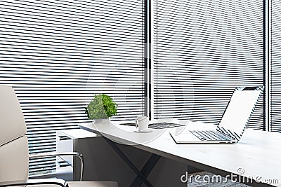 Empty laptop computer in office Stock Photo