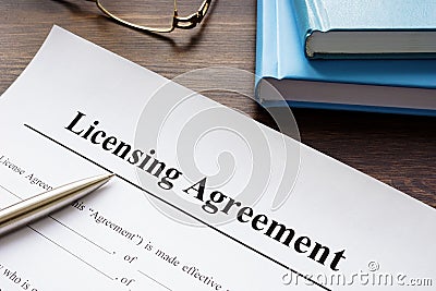 Empty licensing agreement application form and pen. Stock Photo