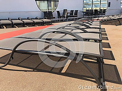 Lounge chairs on a cruise ship deck. Editorial Stock Photo