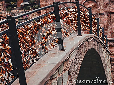 Empty Love Bridge full of love locks under Narikala fort in Tbilisi, Georgia, detail Stock Photo