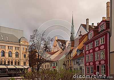 Empty LÄ«vu Square in the Old Town of Riga with beautiful clouds in the sky over it Editorial Stock Photo