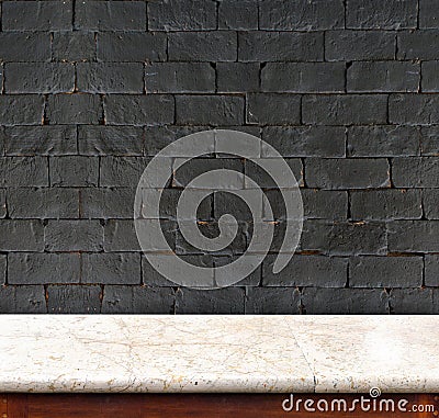 Empty marble table and white black brick wall in background. pro Stock Photo