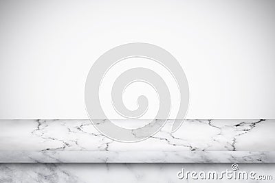 Empty marble table with white gray gradient wall background. Stock Photo