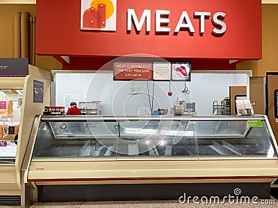 Empty meat counter shelves at a Publix grocery store due to the people panicing and hoarding paper and food products Editorial Stock Photo