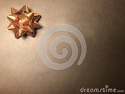 Empty message area with ornament as bright star, note paper or frame on dark and light brown background. Stock Photo