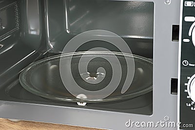 Empty microwave turntable glass tray Stock Photo