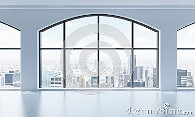 An empty modern bright and clean loft interior. Huge panoramic windows with New York city view. A concept of luxury open space for Stock Photo