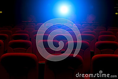 Empty movie theater with projection light Stock Photo