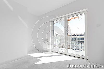 Empty new apartment for interior arrangement. Window light Stock Photo