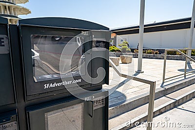 Empty news stand newspaper dispenser for SFAdvertiser.com on street Editorial Stock Photo