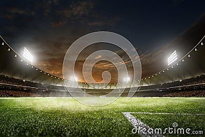 Empty night grand soccer arena in lights Stock Photo