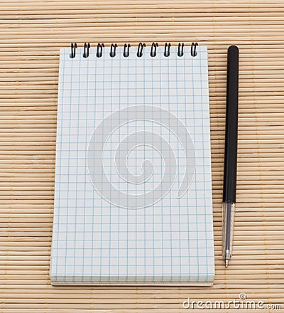 Empty notebook and pen Stock Photo